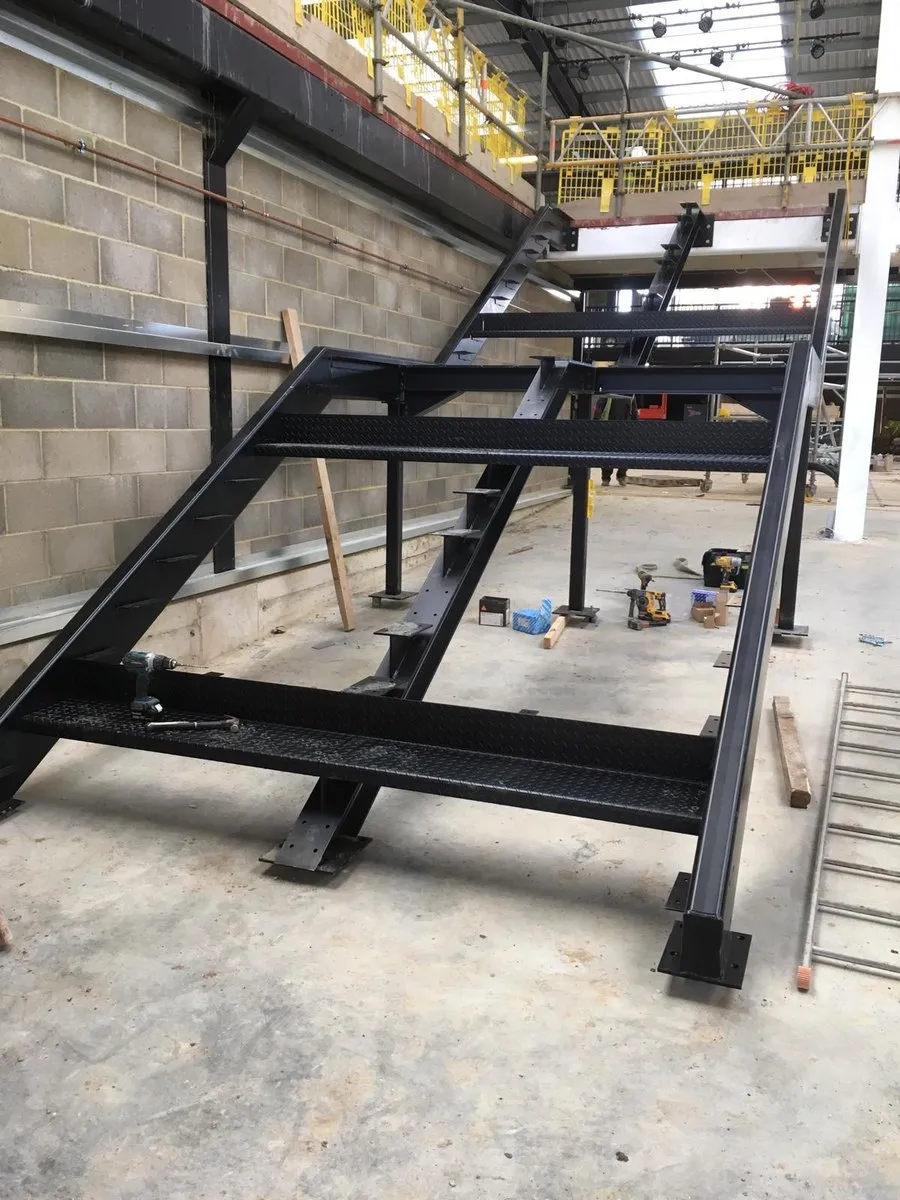 Steel staircase being fabricated and primed in the MRI Fabrications workshop in Harlow