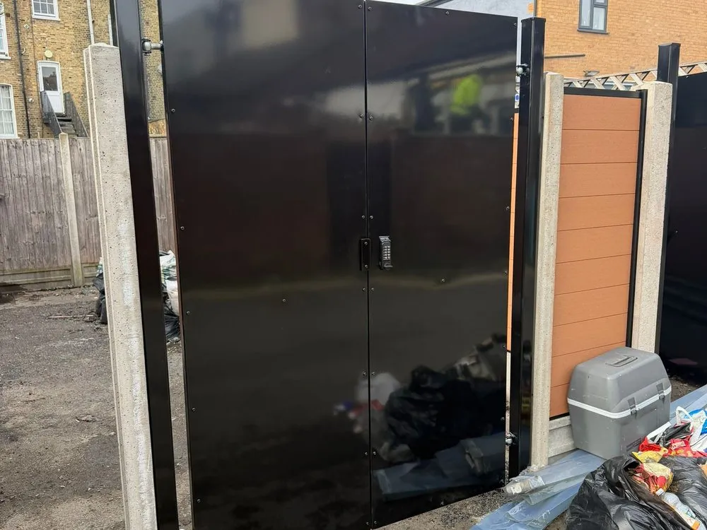 Automated gate with composite board infill panels