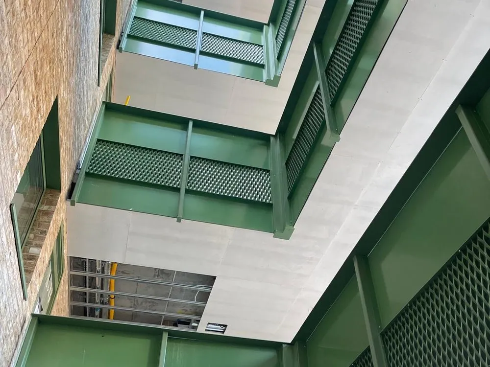Green perforated cladding to a multi-storey car park