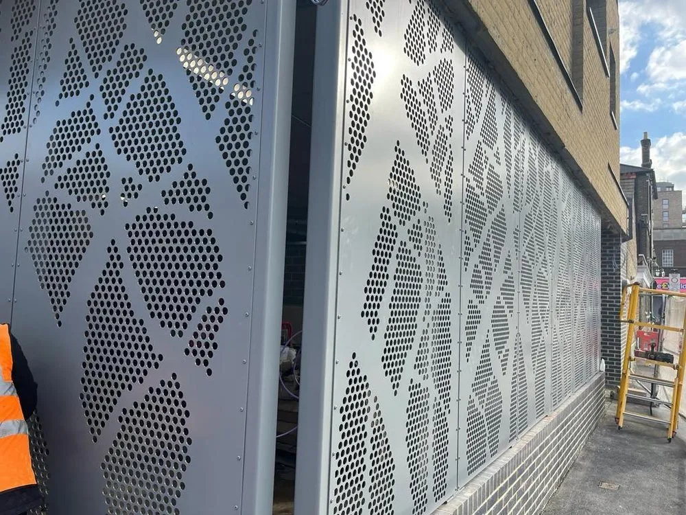 Decorative perforated metal facade panels
