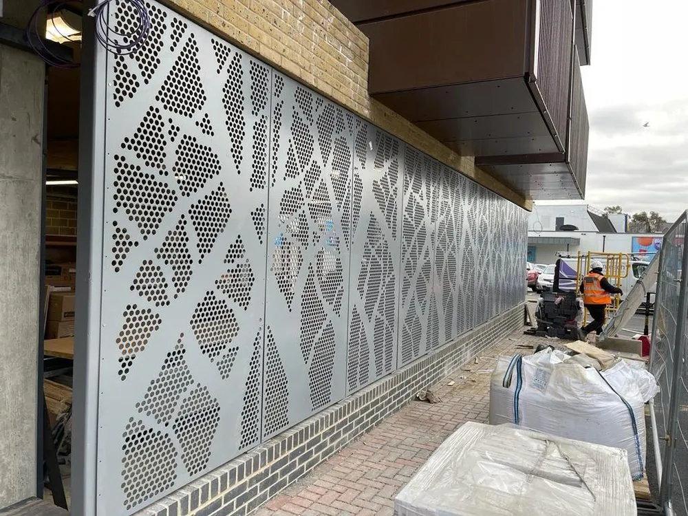 Perforated architectural screens to a London development