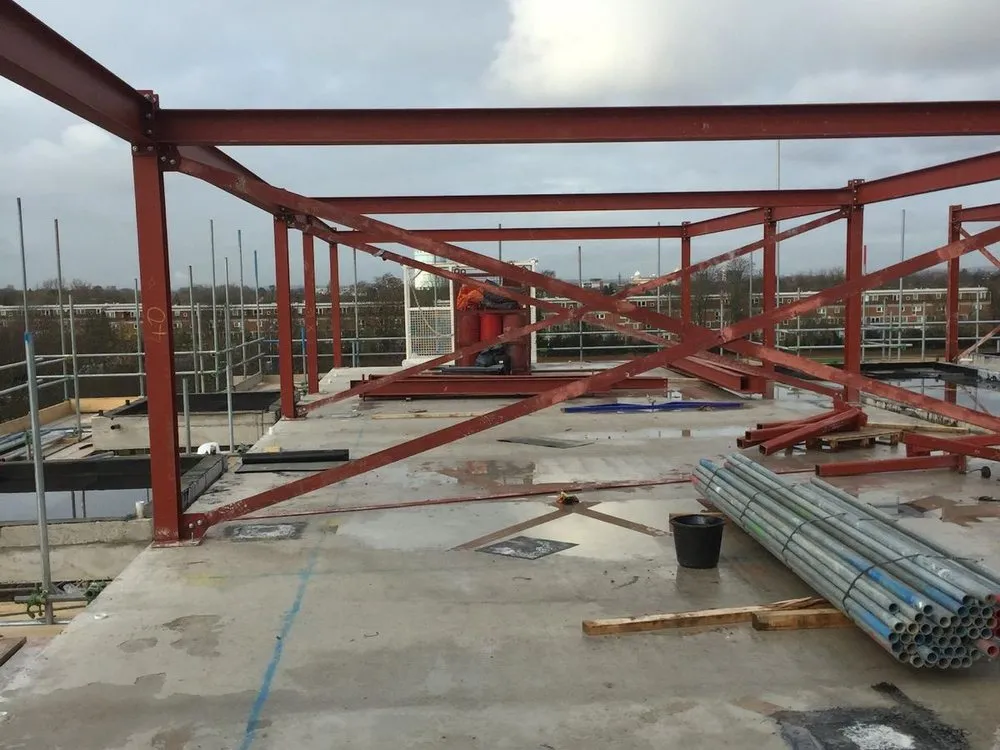 Red oxide steel frame at first floor level